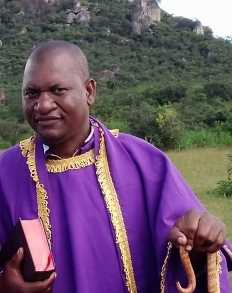 A person in a purple robe
AI-generated content may be incorrect.